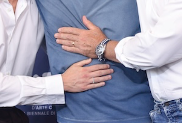 Detail of photo featuring Drew Starkey, Luca Guadagnino, and Daniel Craig at the 2024 Venice International Film Festival. (Vianney Le care/Invision/AP)